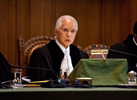 The Registrar of the International Court of Justice, Mr Philippe Couvreur, during the reading of the Order on Provisional Measures in the case concerning the Request for Interpretation of the Judgment of 15 June 1962 in the Case concerning the Temple of Preah Vihear (Cambodia v. Thailand) (Cambodia v. Thailand), on 18 July 2011. 