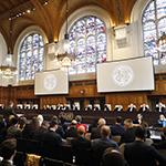 The Members of the Court on the opening day of the hearings. The Members of the Court on the opening day of the hearings.